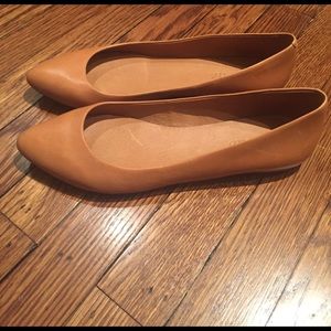 Madewell camel colored flats.