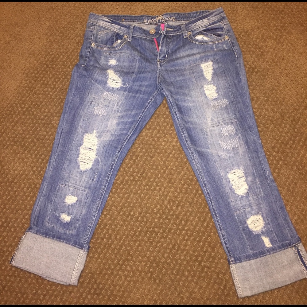 Distressed blue jeans , never worn.