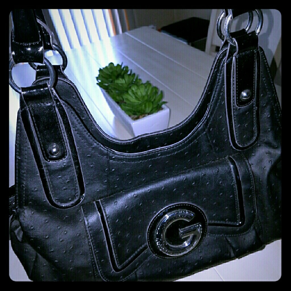 GUESS bag practically new barely used it