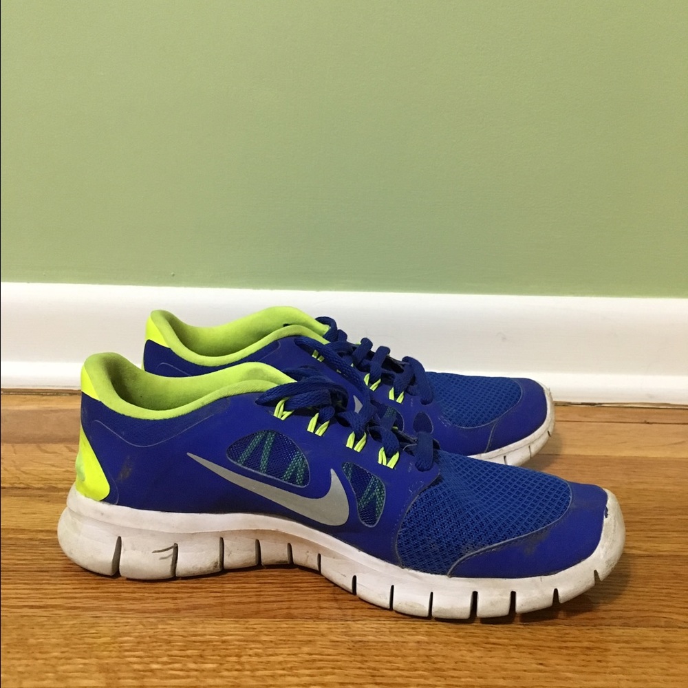 Blue and neon yellow nikes