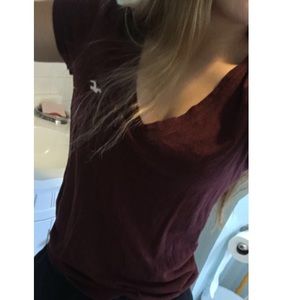 maroon american eagle t-shirt with white logo :)