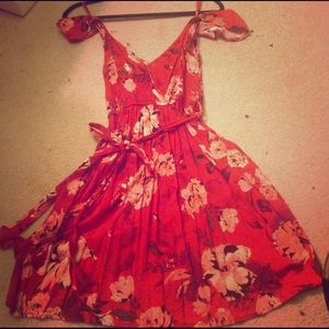 Red flowery cinched dress with pockets