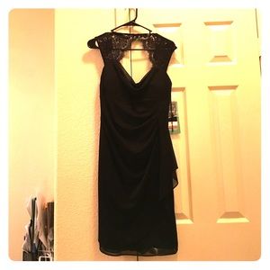 Knee length formal dress with lace shoulder