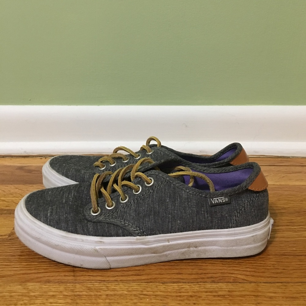 Grey vans with leather strings