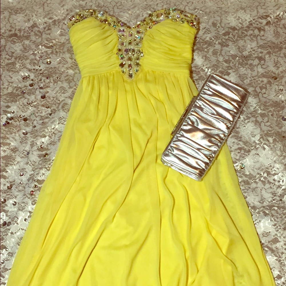 Strapless Canary yellow formal gown.