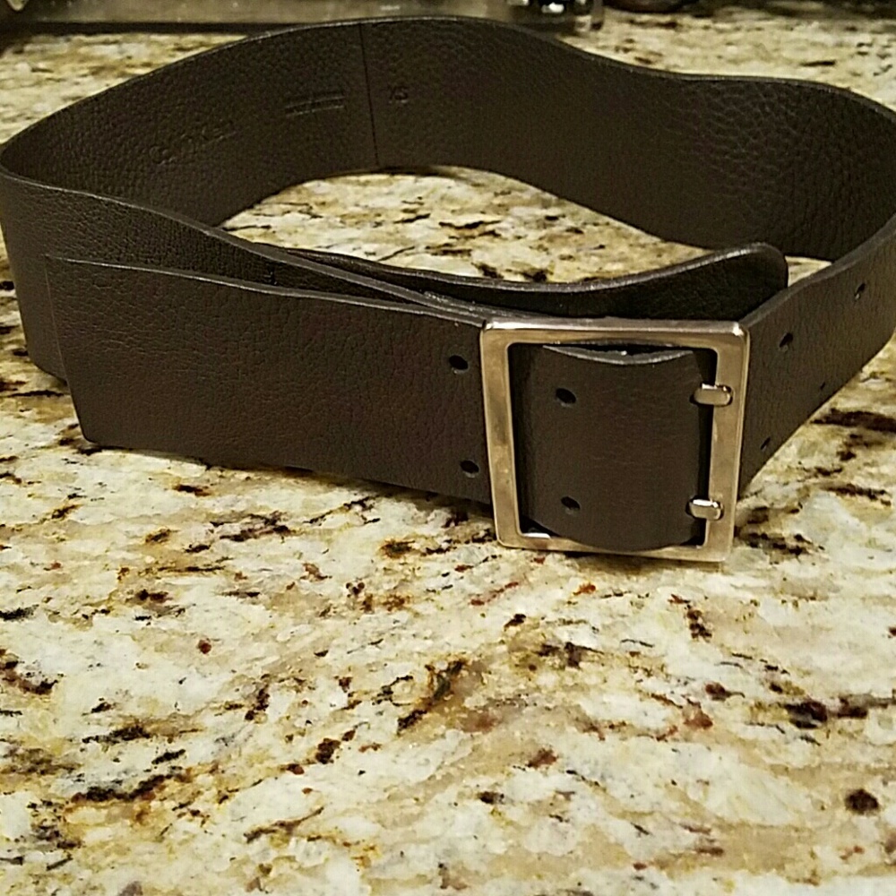 Leather belt by Calvin Klein.