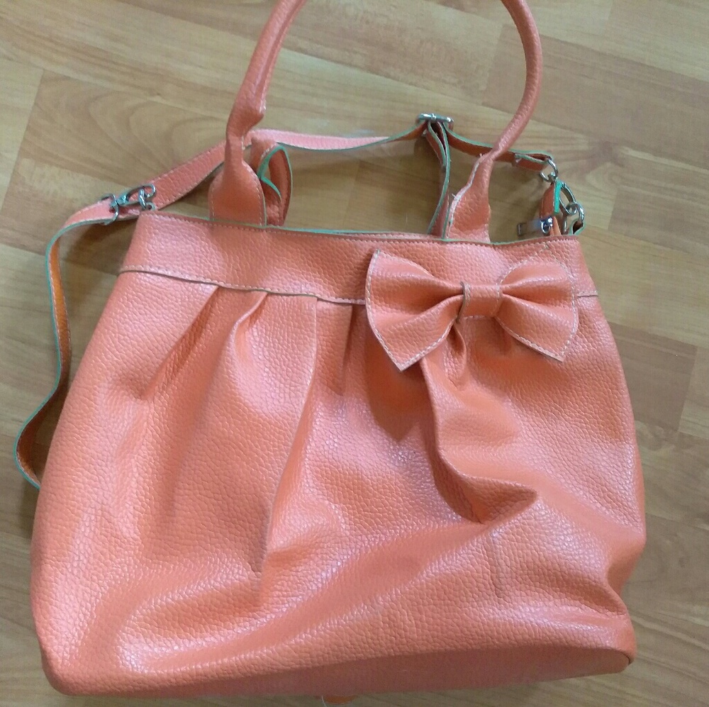Bright orange bow purse