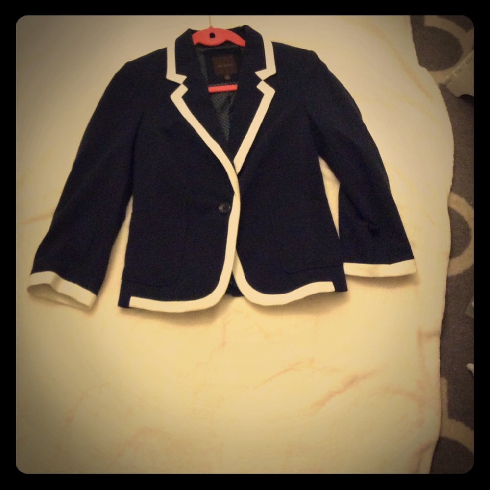 Navy blue blazer with white trim