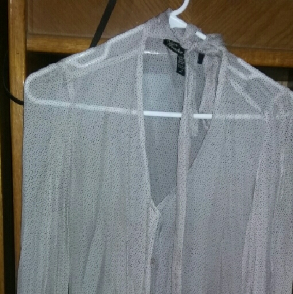 Long-sleeved sheer polka dotted button up