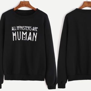 👁 "All Monsters Are Human" Black Comfy Sweatshirt