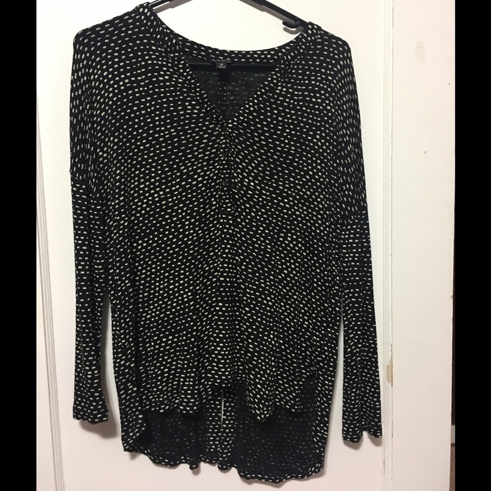 Black shirt with white dots