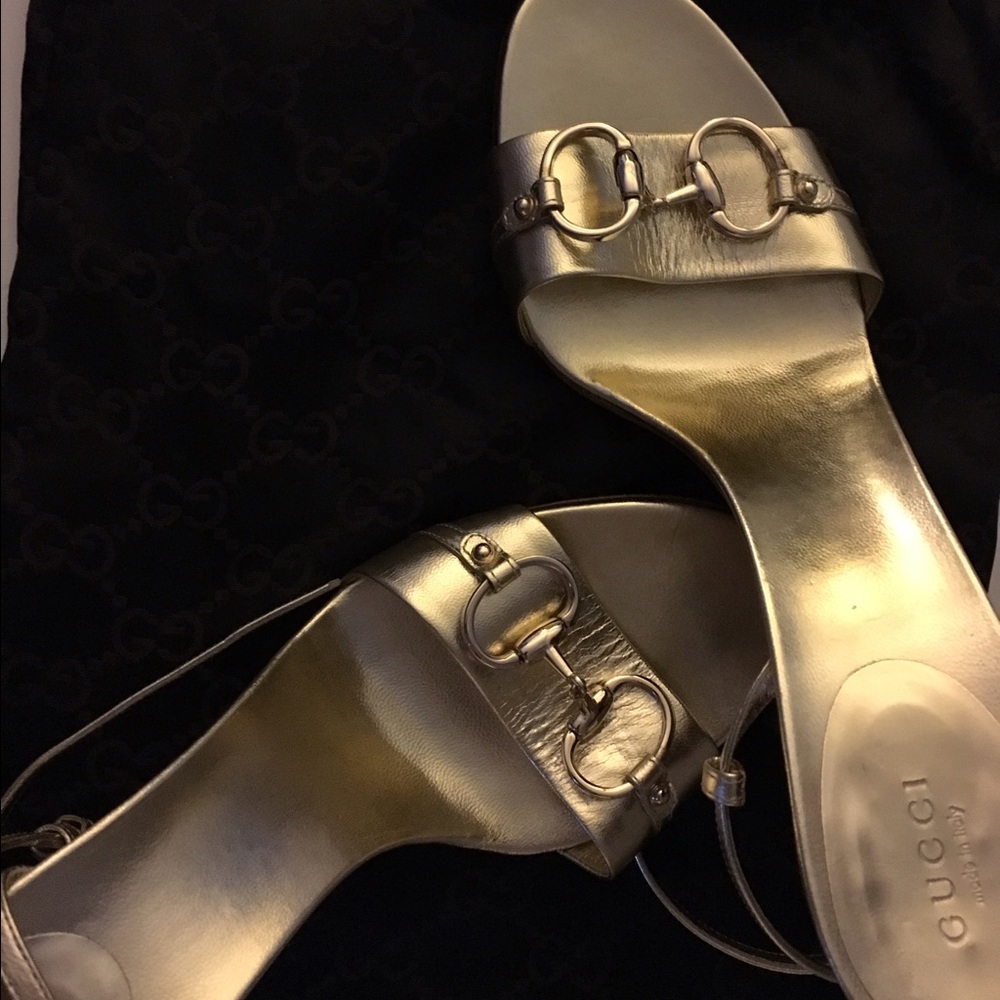 Gold Gucci ankle strap heels
