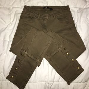Olive skinny jeans with button detail