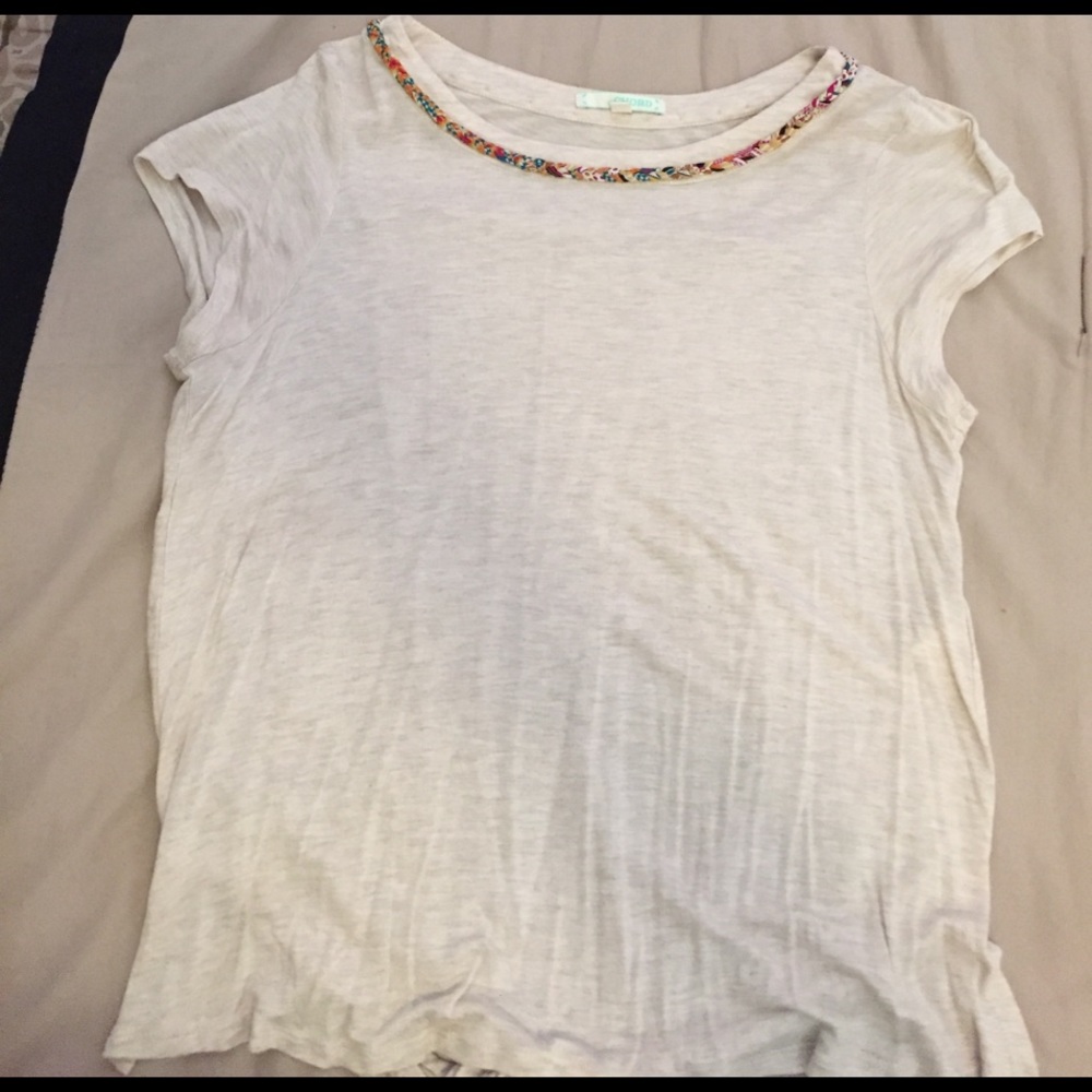 Creme top with a unique back