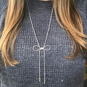 Long bow necklace