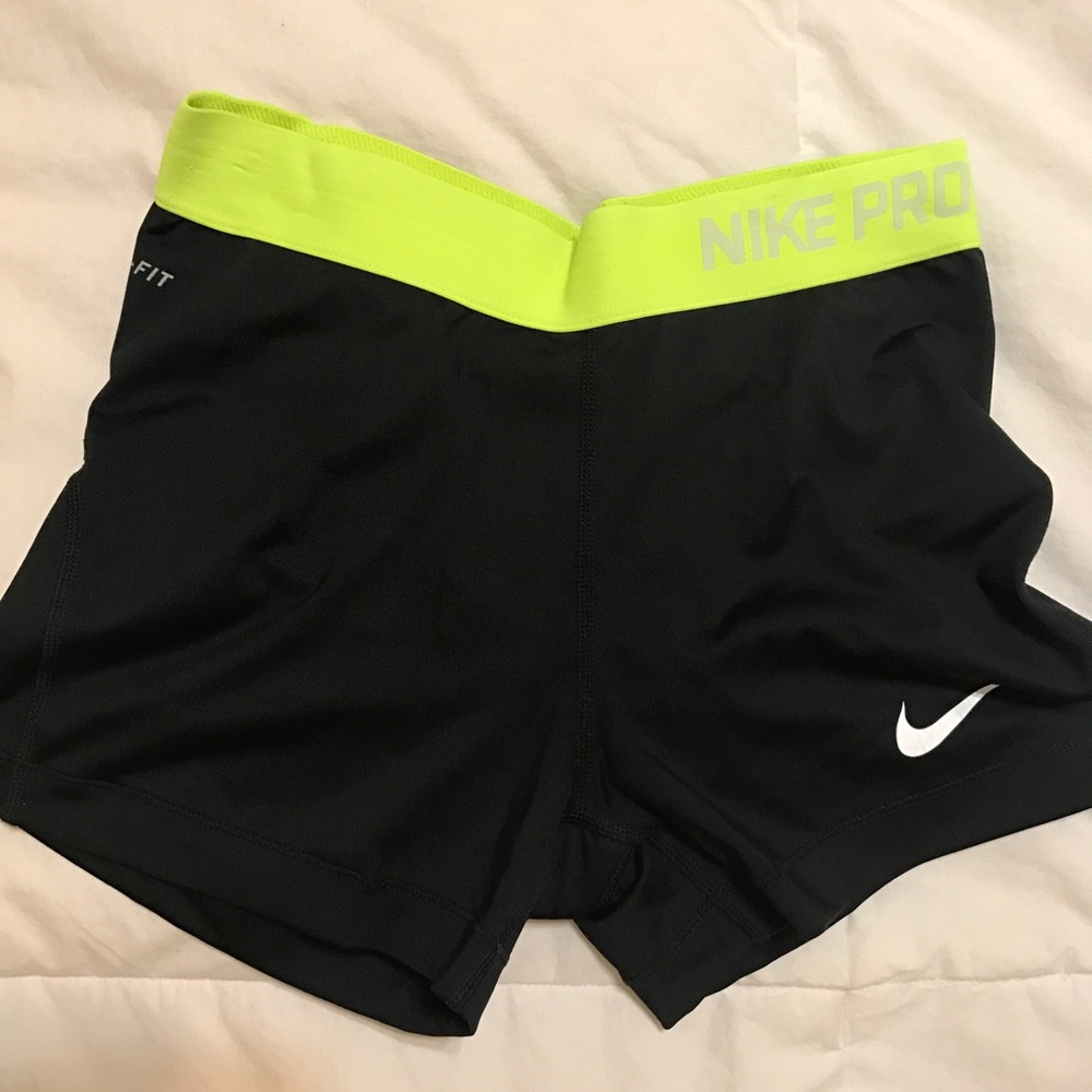 Nike pro shorts with lime green trim size m