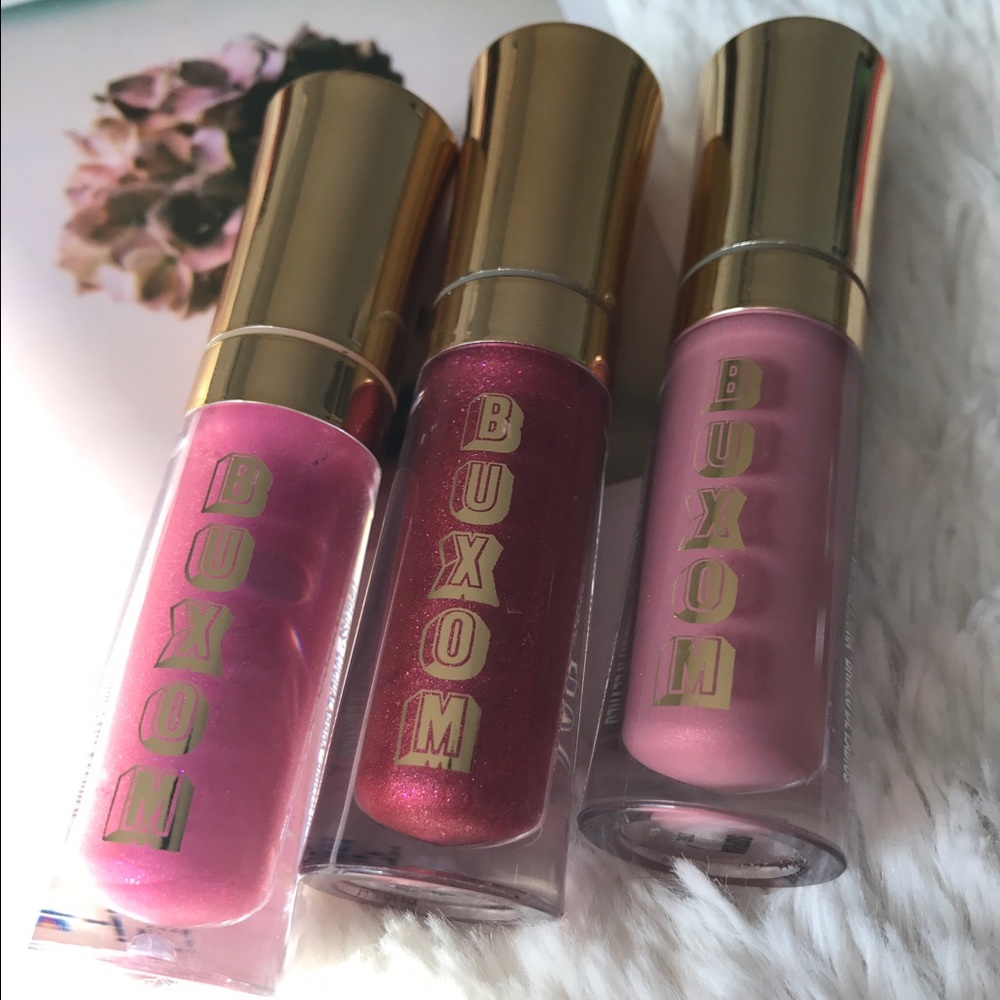 Bare essentials buxom lipgloss set in purples.