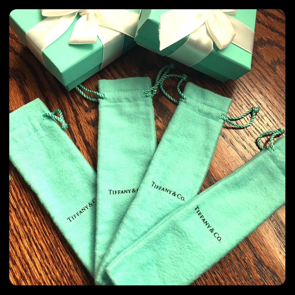 Set of four T&CO pen pouches.