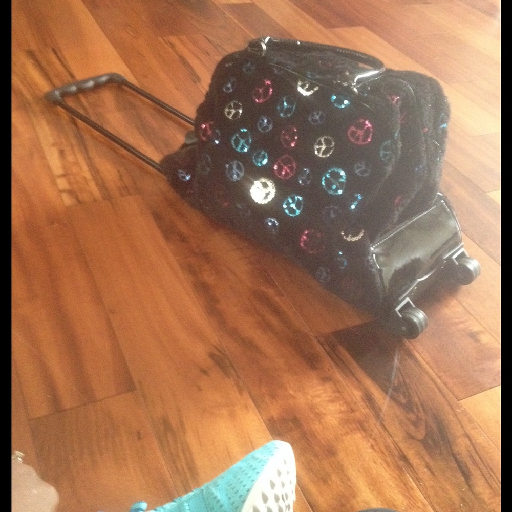 Justice rolling tote bag