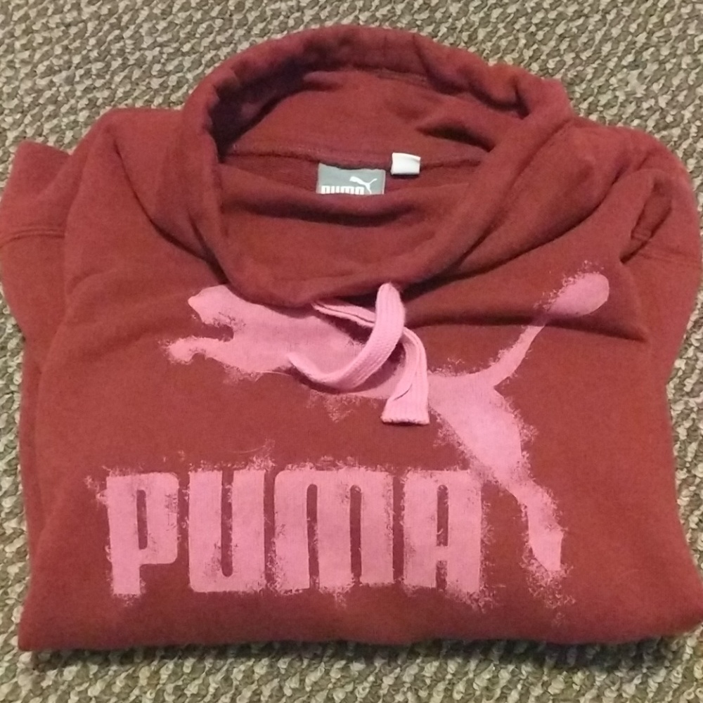 Maroon Puma sweatshirt.