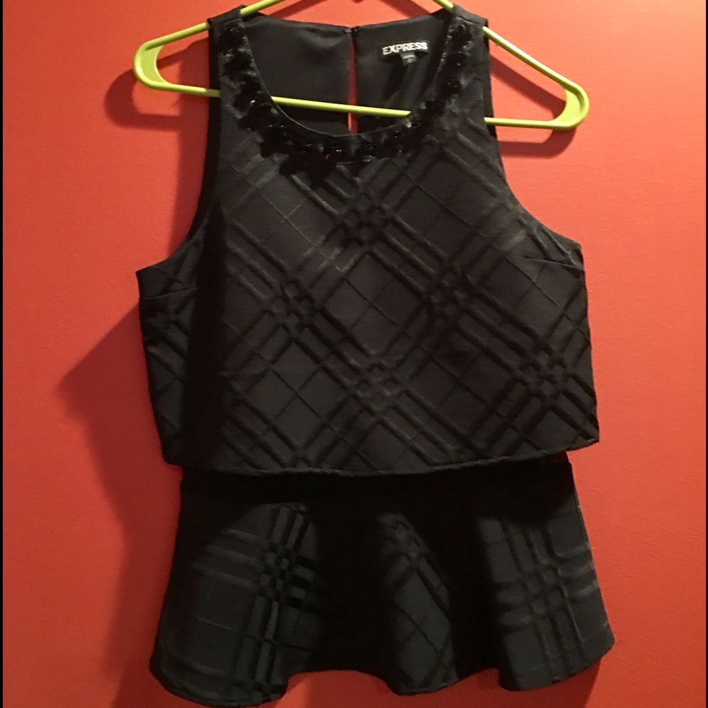 Express Black peplum top.Pair it with white jeans.