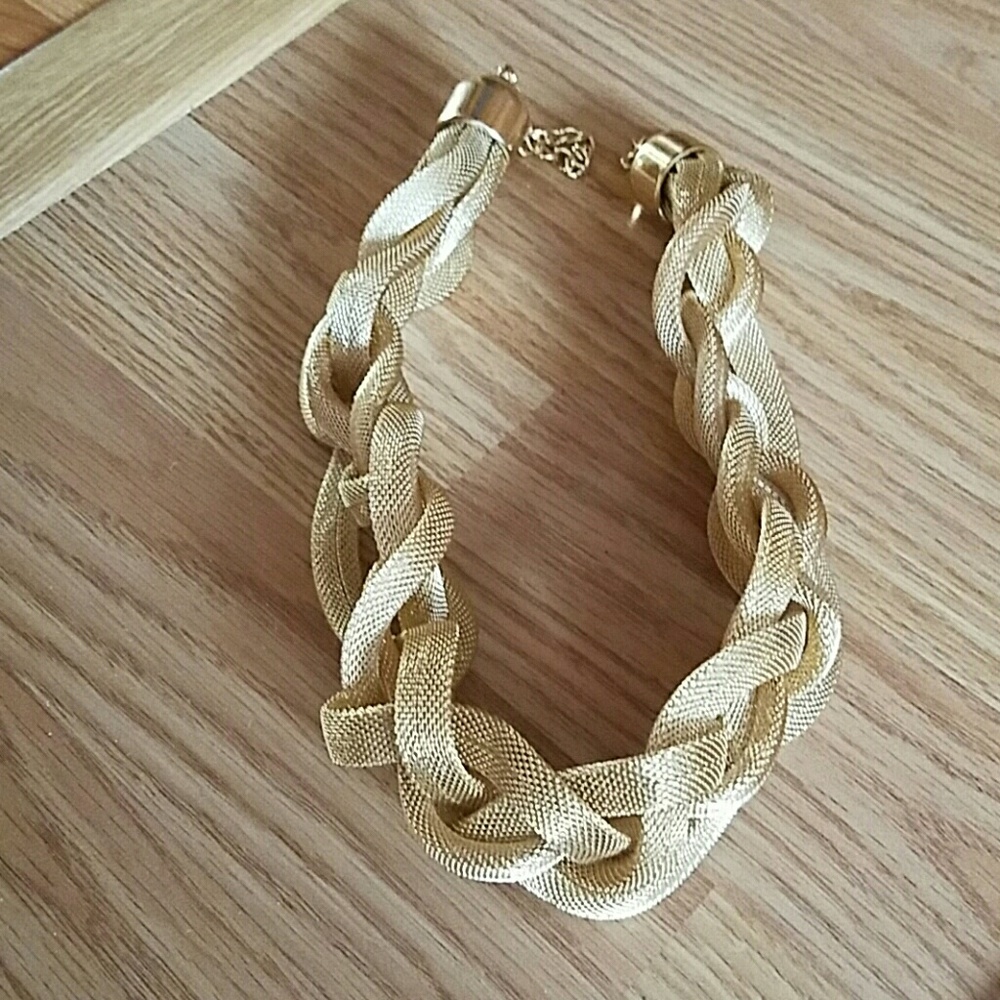 Thick gold intertwined braid like necklace