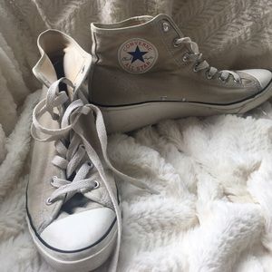 Light gray Converse high top sneaker wedge.