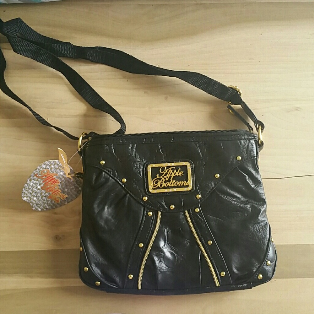 Black cross body apple bottoms bag