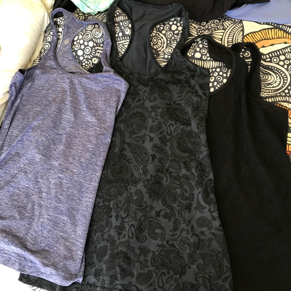Lace, paisley and heathered blue lululemon tanks