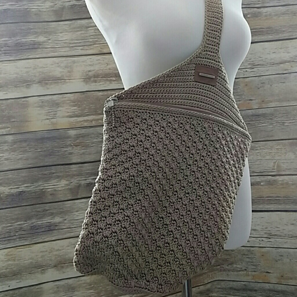 Super cool the sak crossbody bag. Tan crochet.