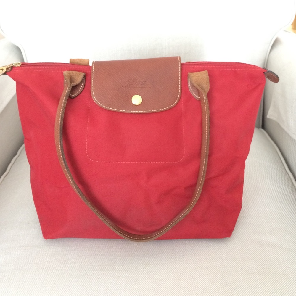Red small Le pliage tote by Longchamp