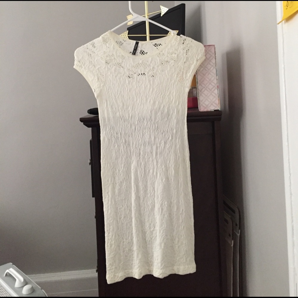 Short white bodycon dress