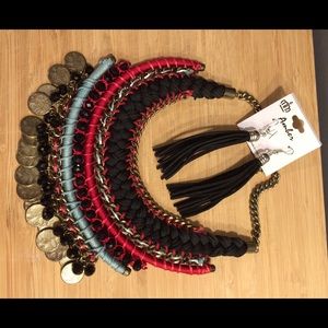 Statement necklace and fringe leather earrings