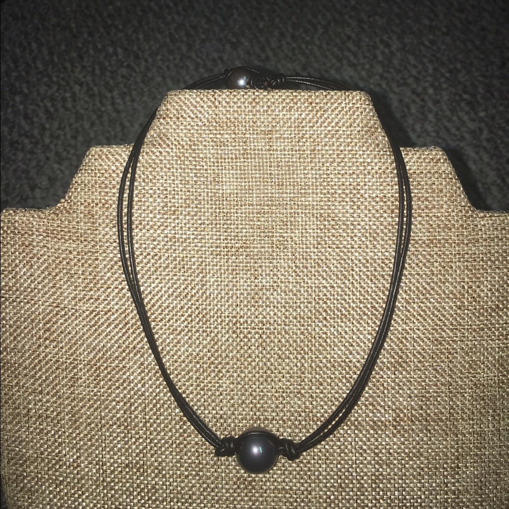Black pearl on black leather necklace
