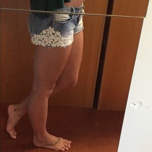 Light washed, denim jean shorts with lace