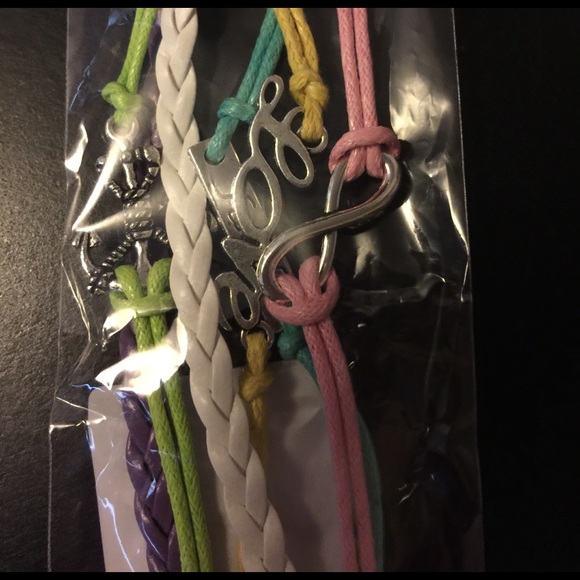 New bracelet. Multi colored leather wrist band. - Picture 1 of 2