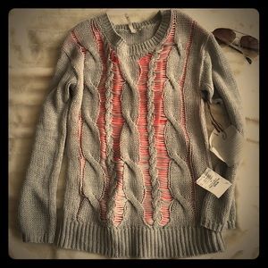 Grey sweater with pink insert detail