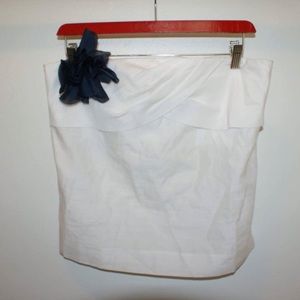 Sleeveless J. Crew top with blue flower pin