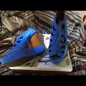 Gorgeous blue suede tie up wedges.