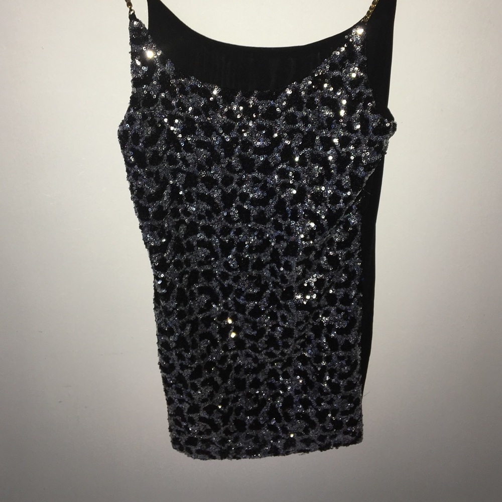 Black and silver sequined top