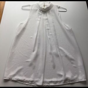 High neck white sleeveless blouse