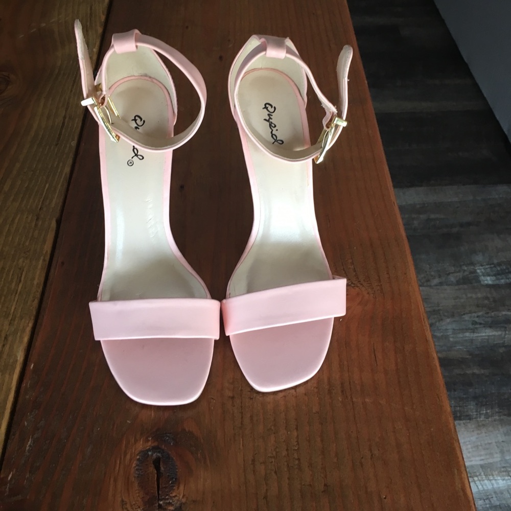 Pink heels with gold hardware