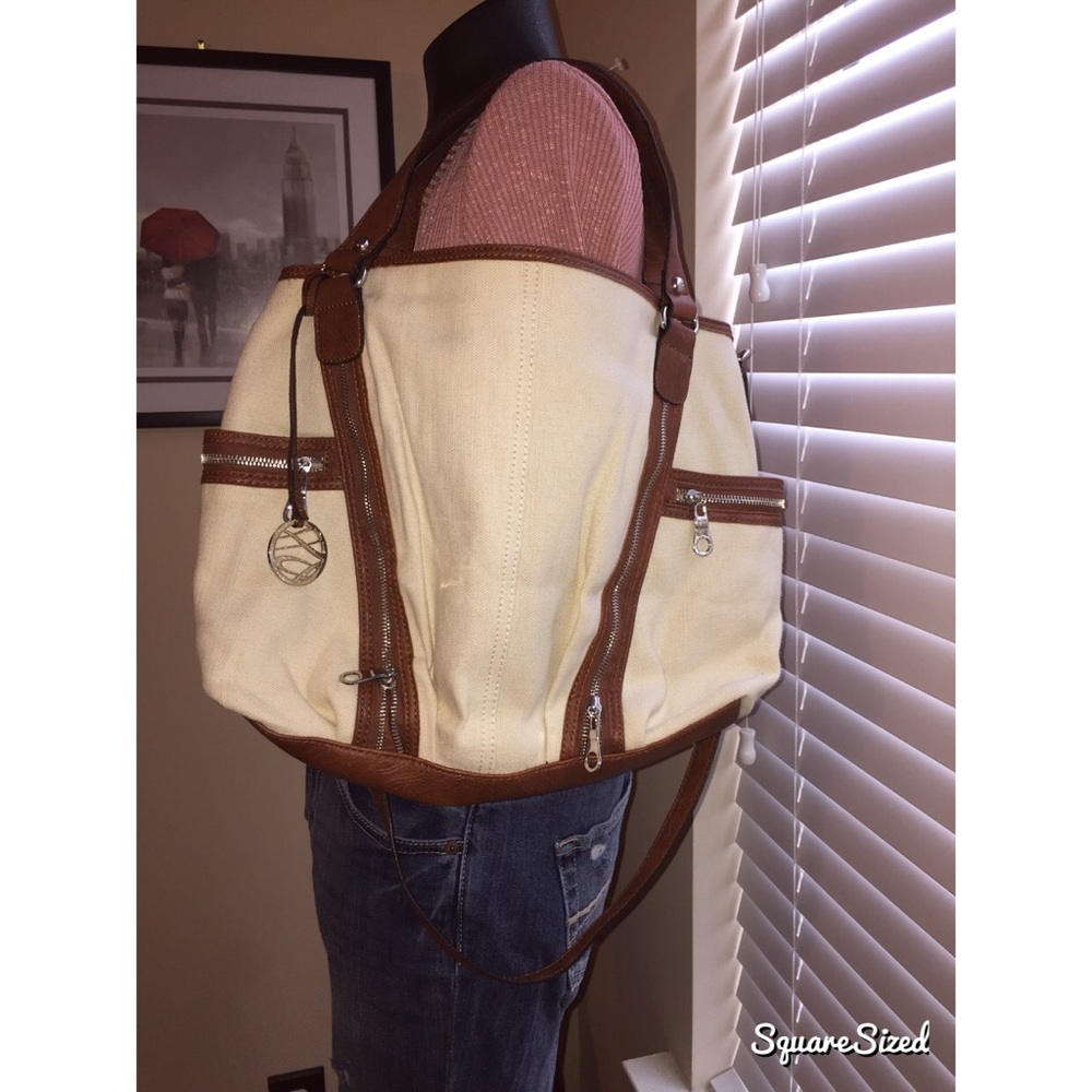 New never worn brown leather and linen purse!