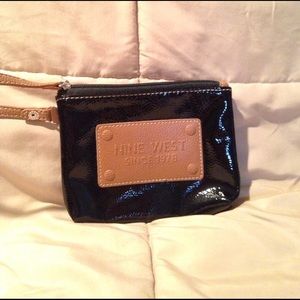 black and brown Nine West wristlet