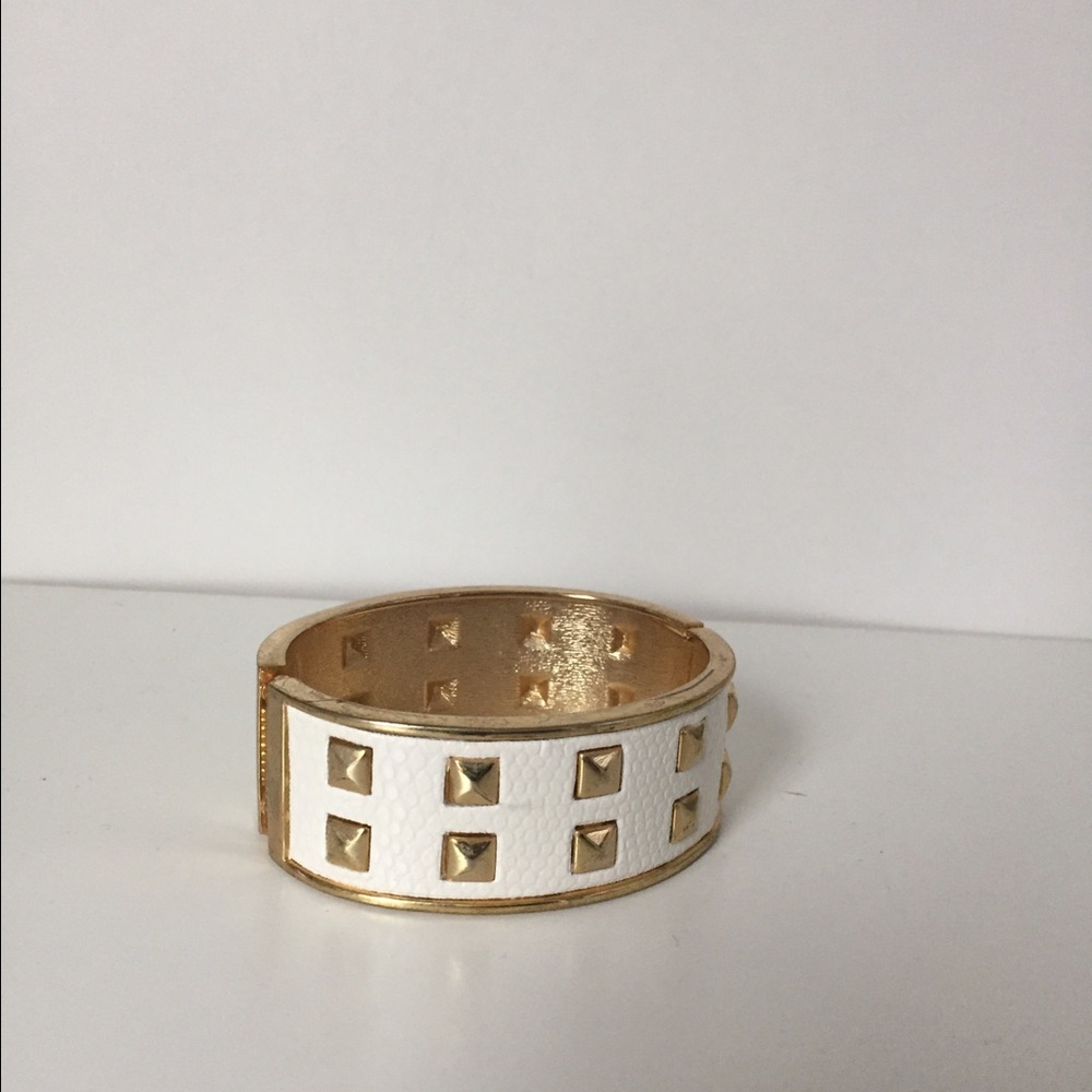 White and gold tone cuff
