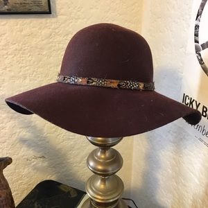 Brown felt hat with feather band