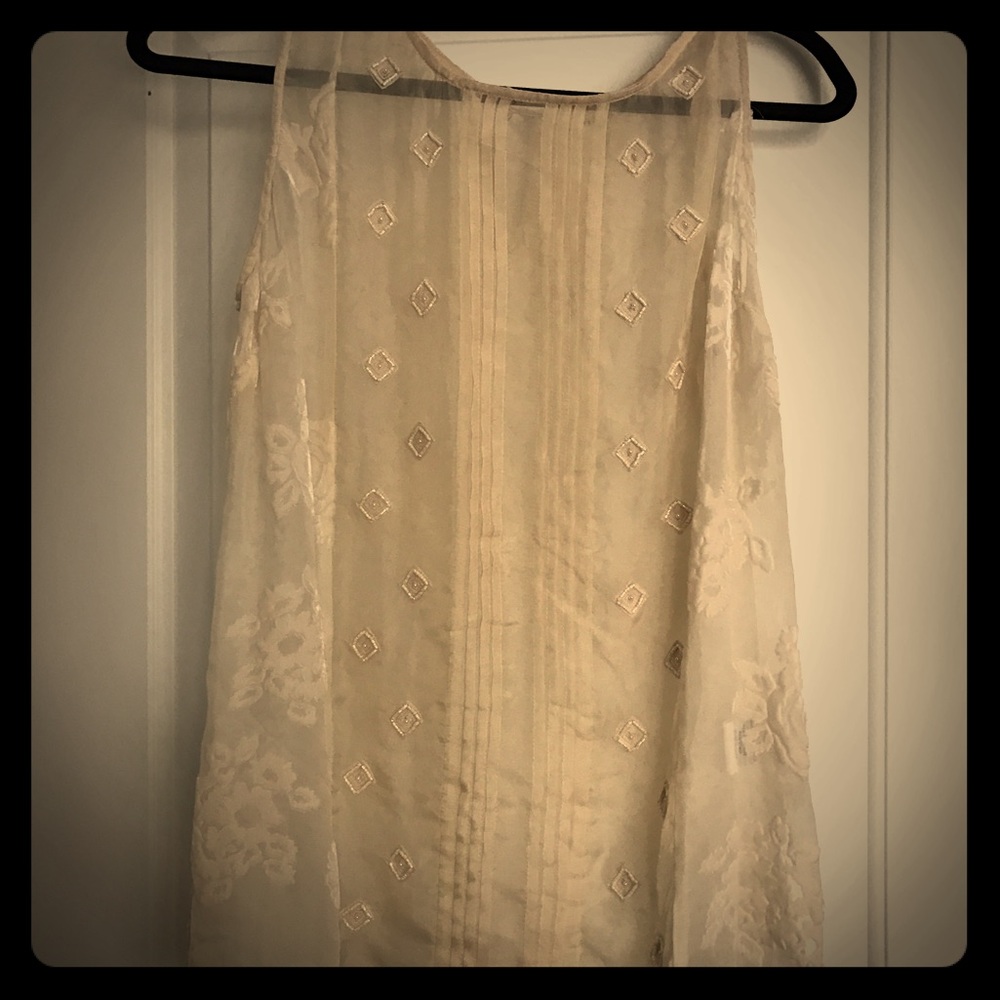 Off white silk sleeveless top; beading