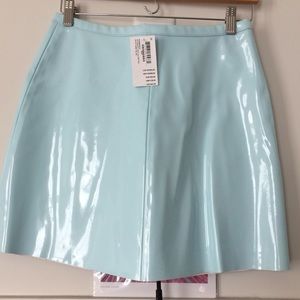 Zip front vinyl A-Line mini