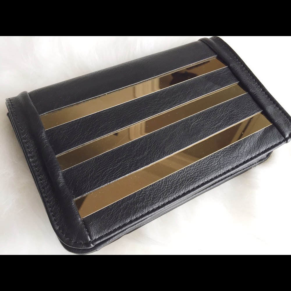 Black and gold clutch.