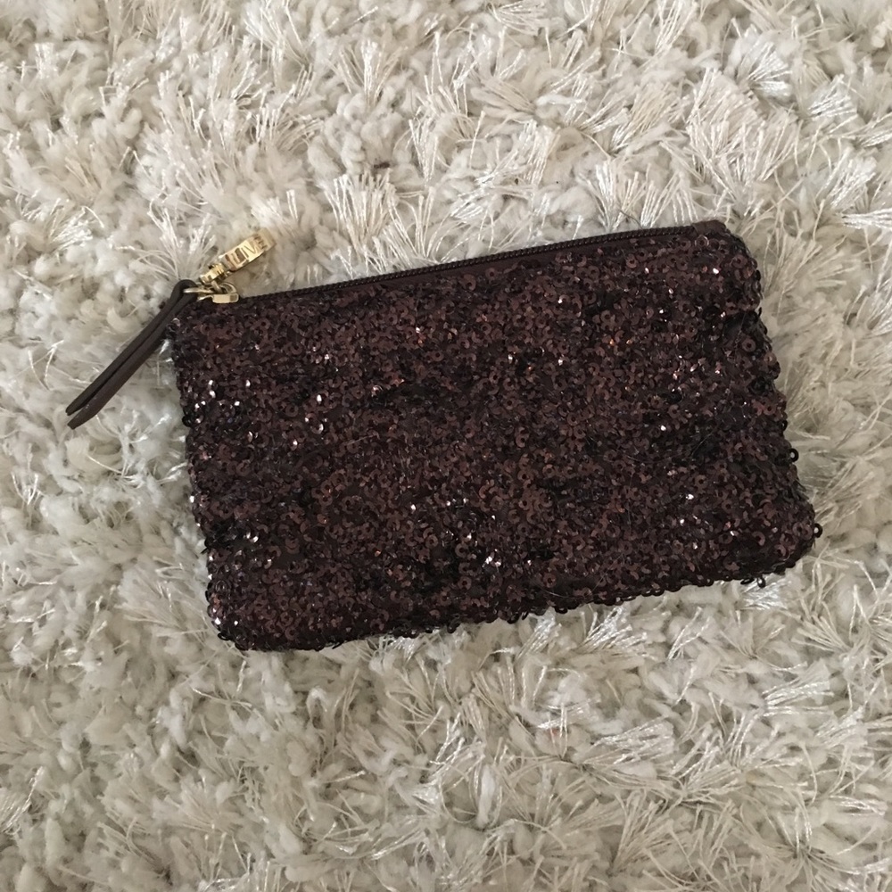 Purple sparkly polka dotted makeup bag